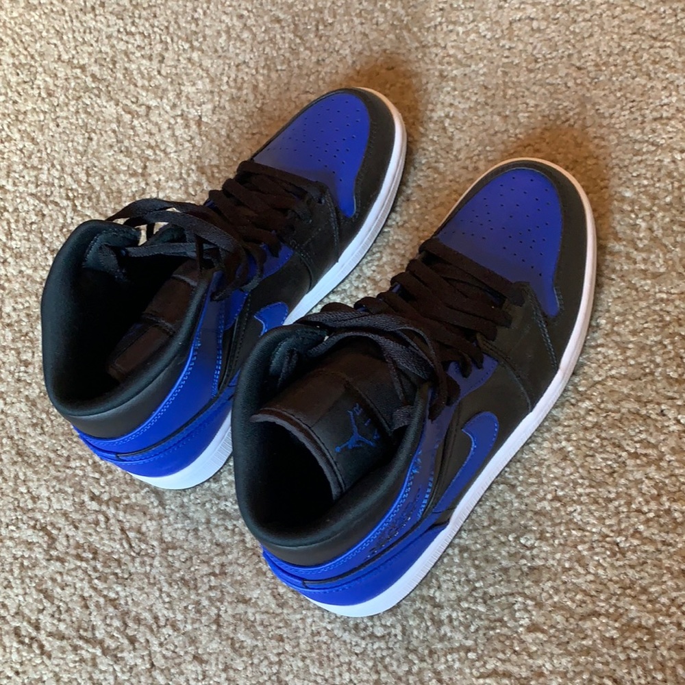 Blue and black Jordan ones
